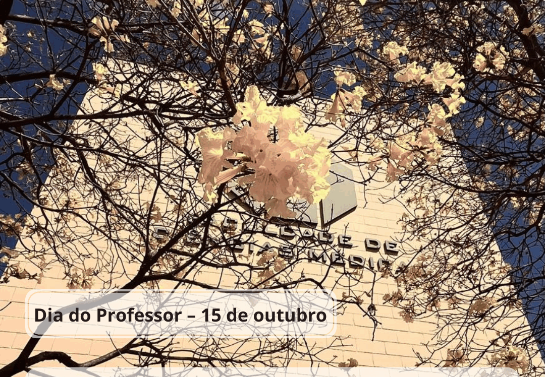 Fotografia do prédio da Faculdade de Ciências Médicas da Unicamp vista de baixo para cima, emoldurada por galhos floridos de ipê-amarelo sob um céu azul. No topo da imagem estão os logotipos da Faculdade de Ciências Médicas e da Unicamp. Na parte inferior, sobre um fundo translúcido, aparece a mensagem: “Dia do Professor – 15 de outubro”. Abaixo, uma citação de Rubem Alves: “Para isso existem as escolas: não para ensinar as respostas, mas para ensinar as perguntas. As respostas nos permitem andar sobre a terra firme. Mas somente as perguntas nos permitem entrar pelo mar desconhecido”.